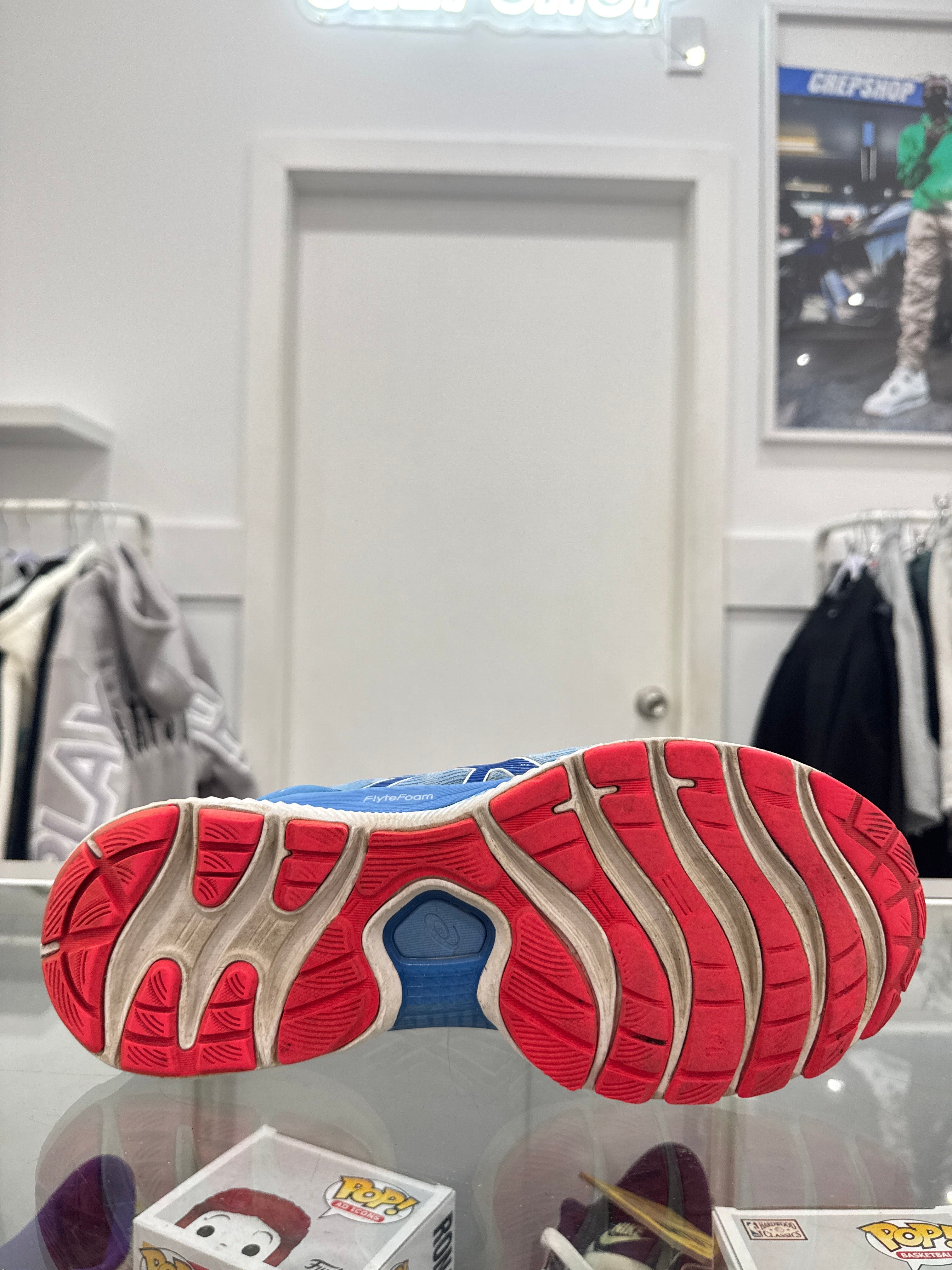 Used Womens GEL- Nimbus 22  Blue Red 11
